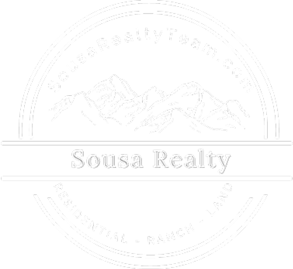 Sousa Realty logo with mountain design.